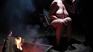 Naked beauty in the forest indulges in outdoor pleasure