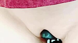 Mature cougar's big pussy lips slide and grind, wet and hairless.