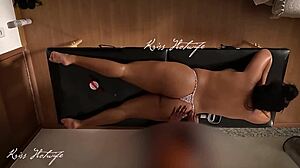 Married woman gives massage with exposed breasts