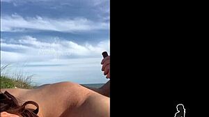 Redhead wife gives blowjob and doggystyle on beach