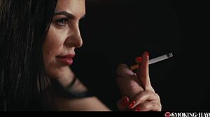 Hot brunette teases with handjob while smoking 😏.