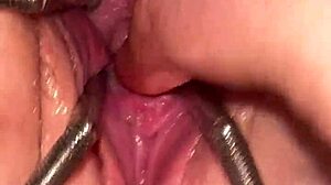 Watch the fist queen get her pussy stretched with a metal ring in this extreme session!