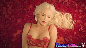 Watch petite blonde teen Elsa Jean strip and pose naked in red petals?