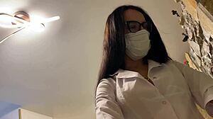 hot nurse in latex gloves arranges therapy session