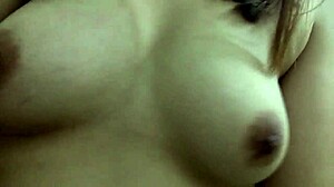 Filipina girlfriend shows her lovely natural tits in homemade video