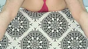 Look at this milf in red lingerie teasing her natural tits!