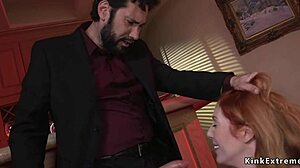 police officer engages in anal sex with redhead woman in bondage