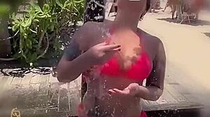 who likes seeing me suck this big black cock on the beach?