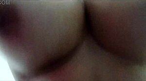 brunette amateur bounces big natural tits closeup