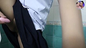 Horny student touches herself in bathroom