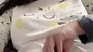 Individual applies hair clamp during personal activity