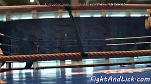 European women wrestle on the floor