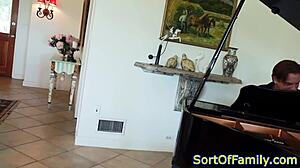 Black stepdaughter positioned by the piano