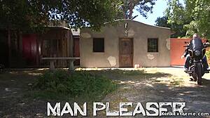 Biker Unchains Blonde In BDSM Scene