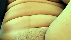 beautiful latina girl explores her tight pussy with a cucumber for the first time in her bedroom.