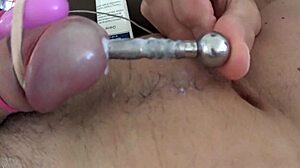I explore sounding my penis and watch the cum flow