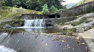 having fun at the waterfall with a friend