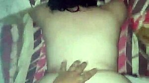 A woman with a big ass bends over on all fours