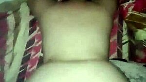 A woman with a big ass bends over on all fours