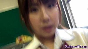 asian teen rubs her hairy pussy