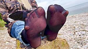 beautiful nylon feet teasing in jeans outdoor