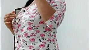 Milf dances seductively, showcasing her beautiful ass and big nipples