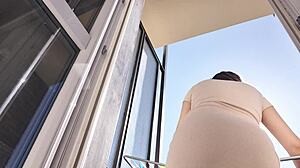 Hot Latina Shows Off Her Ass And Pussy On The Balcony Without Panties