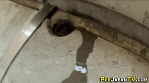 Asian babe pees in public outdoor voyeur