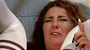 lesbian inmate endures intense anal fisting in bondage.