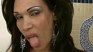 Hey, check out this stunning Brazilian shemale hottie jerking her big cock solo