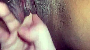 White guy fingers black wet pussy with intense strokes