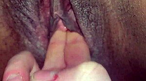 White guy fingers black wet pussy with intense strokes