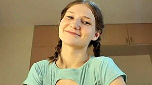 this cute petite babe jerks off huge dick with feet at home