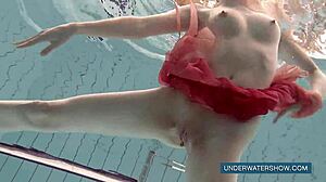 katya okuneva in red dress by the pool