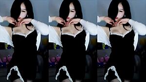 chinese girl dances sensually in traditional outfit