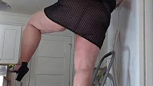 Maid Cleans House In Mini Dress Without Panties, Close-Up View