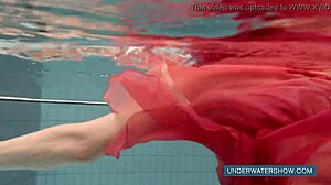 katya okuneva in red dress by the pool