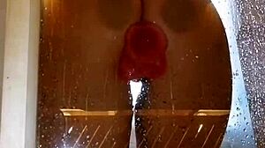 Girl Teases Her Appetizing Ass with Pink Dildo in Shower!