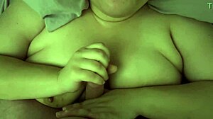 Surprise cumshot during titfuck