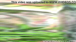 Curvy blonde woman tries on bikinis in the garden