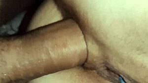 Close-up view of sphincter stretching during anal sex.