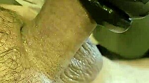 Tattooist drains big balls during intense session