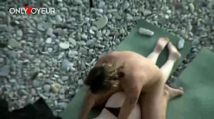 Beach voyeur watches brunette teen flash panties and get cum on ass in public.