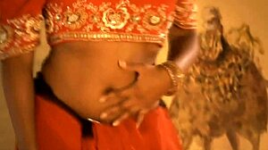 Look at this gorgeous Indian woman with her natural body, stripping sensually on stage.