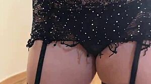 A beautiful Latina dances in lingerie and costumes at home, feeling sexy