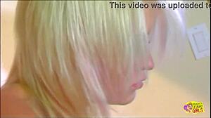 Classic lesbian babes in high heels kiss and suck on a glass sex toy together