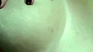 the bbw hotwife plays with her big boobs and inserts dildos into her pussy