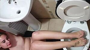 i'm pissing on feet over the toilet while getting a footjob and blowjob
