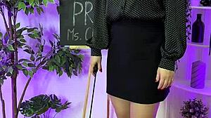 Sexy milf putting on leather harness suit