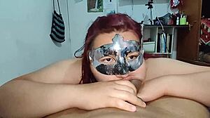 She plays with dick in mouth and rubs it on face